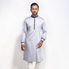 Man wearing a Light Ash panjabi with red details on a white background